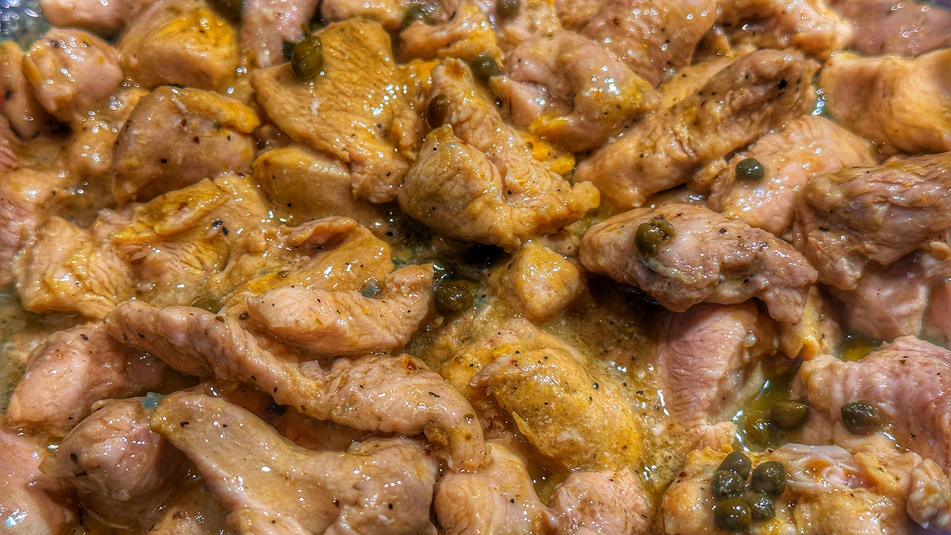 Turkey cooking in pan