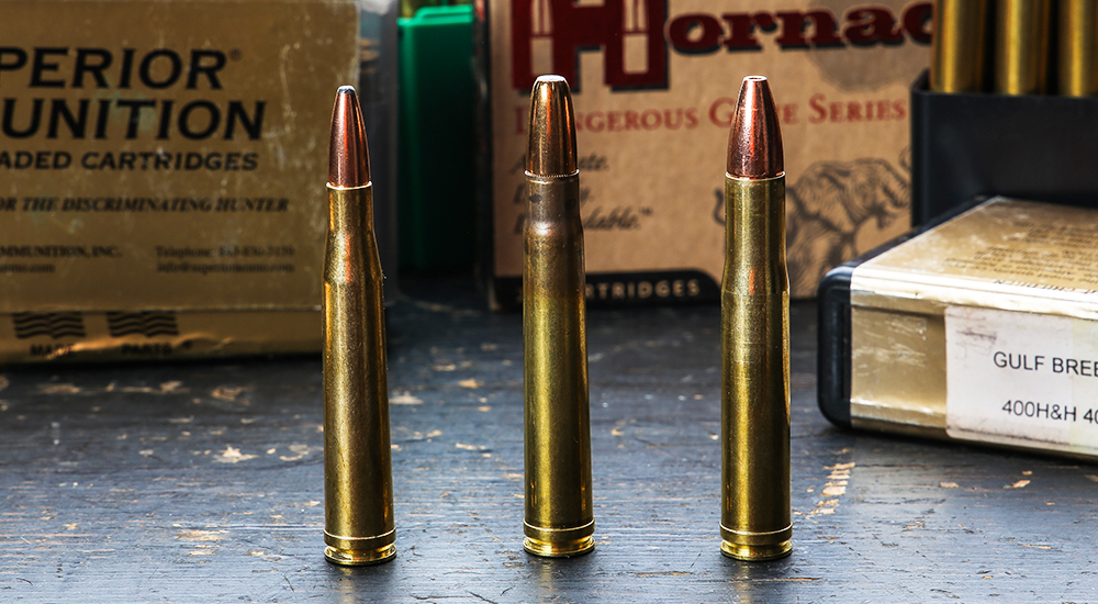 Side by side standing .400 Holland and Holland Magnum ammunition cartridges.