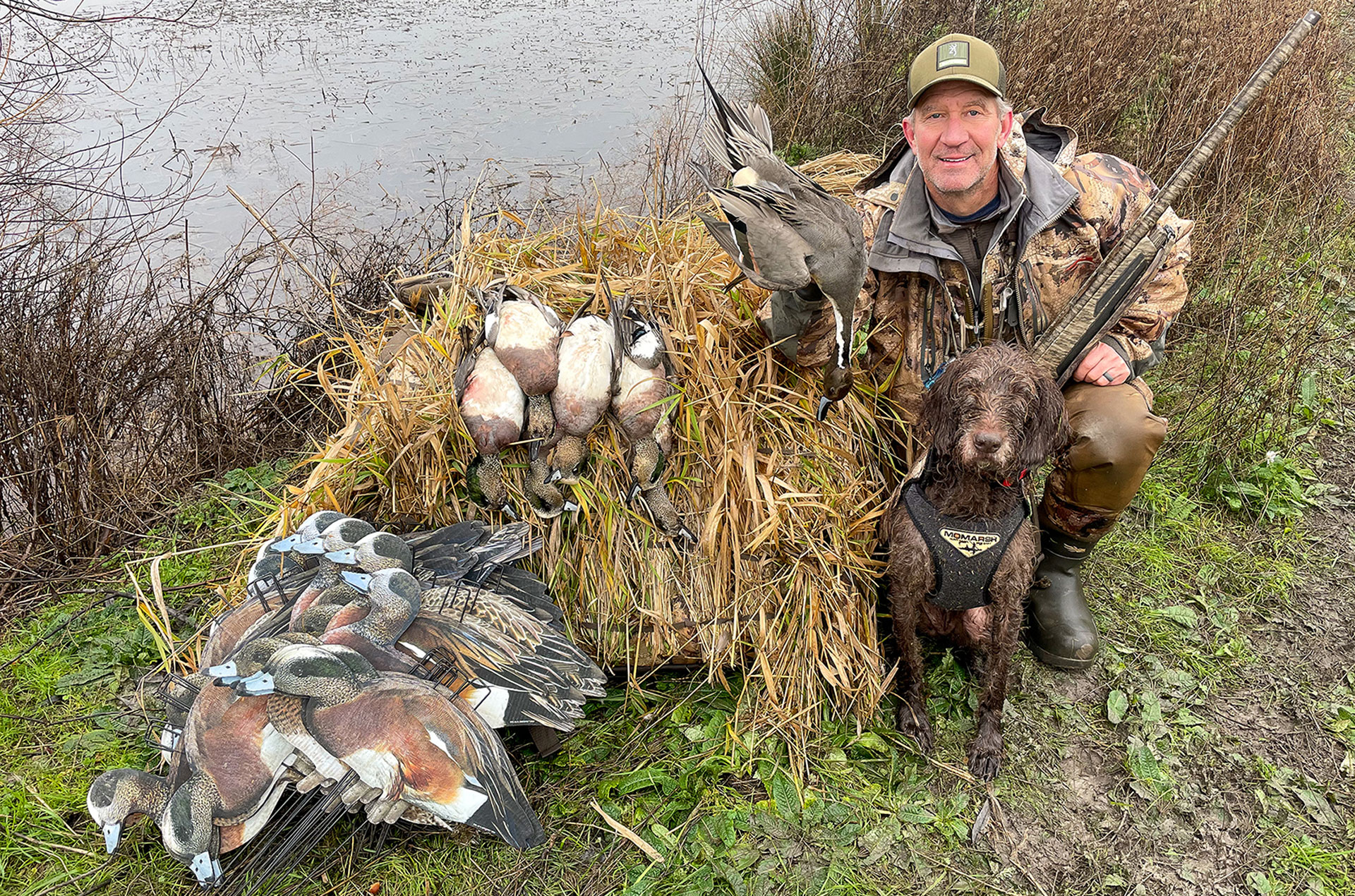 Hunter with Ducks and Dog