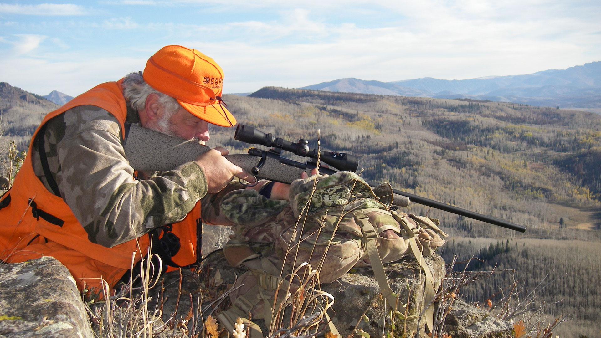 Hunter Shooting Down A Hill
