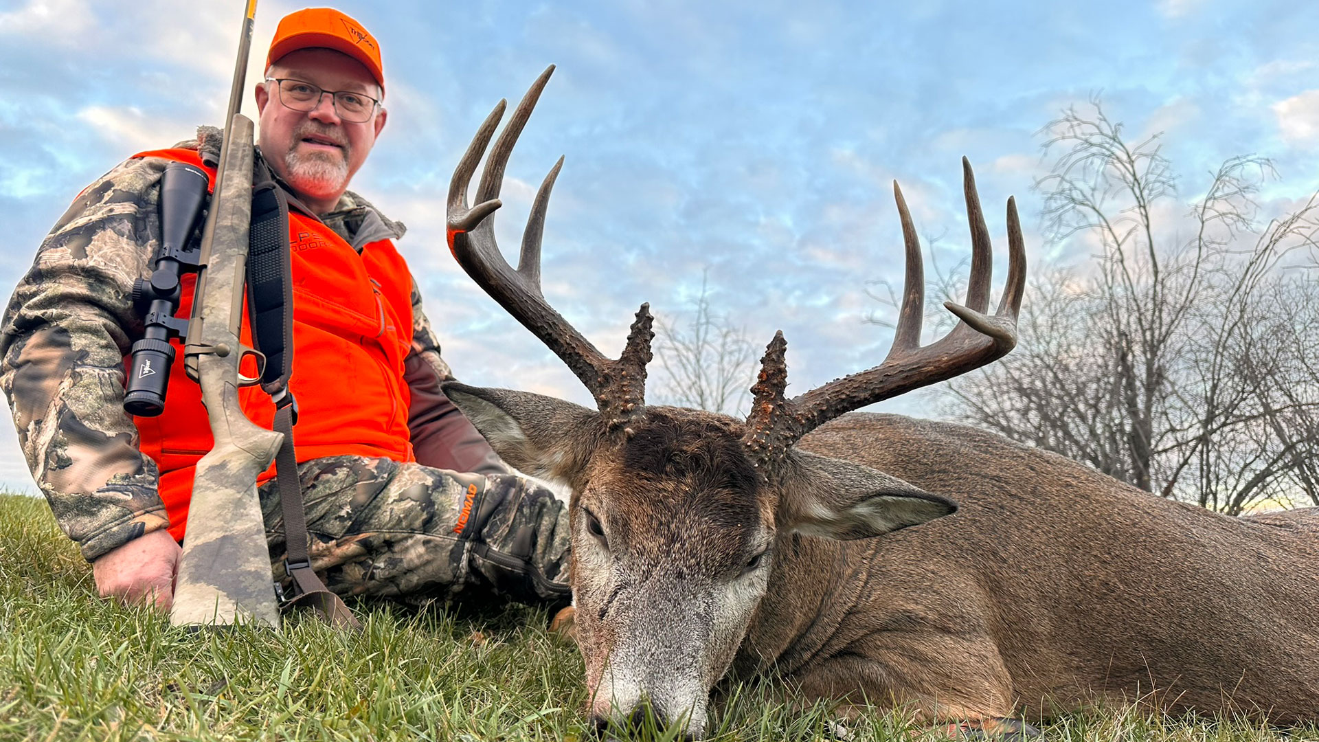 Hunter with Huron and deer