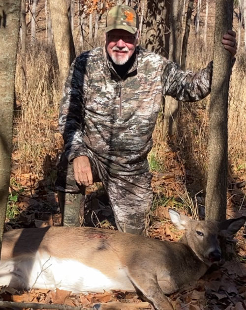 Mike Roux with doe