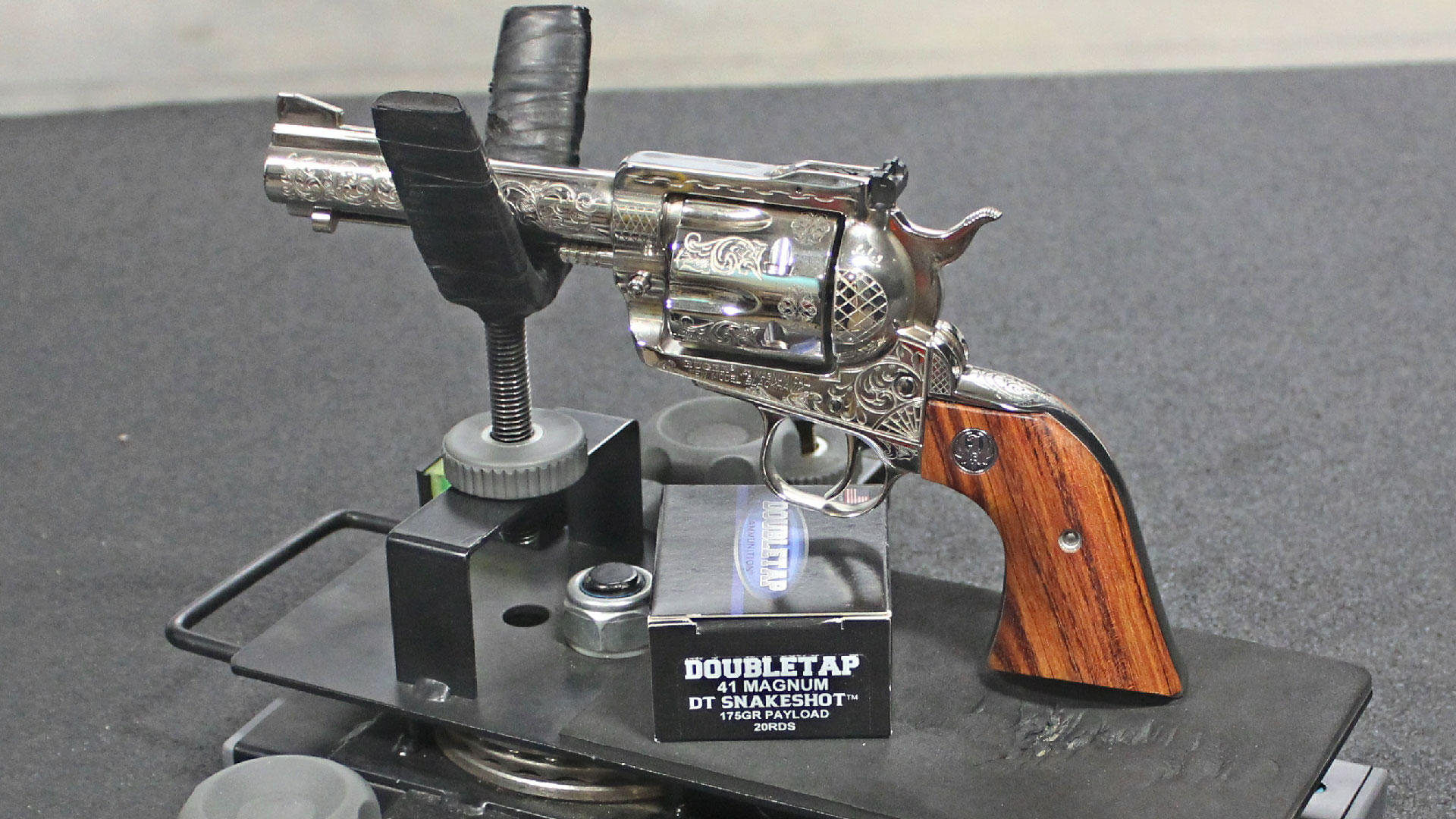 Elegant revolver in stand