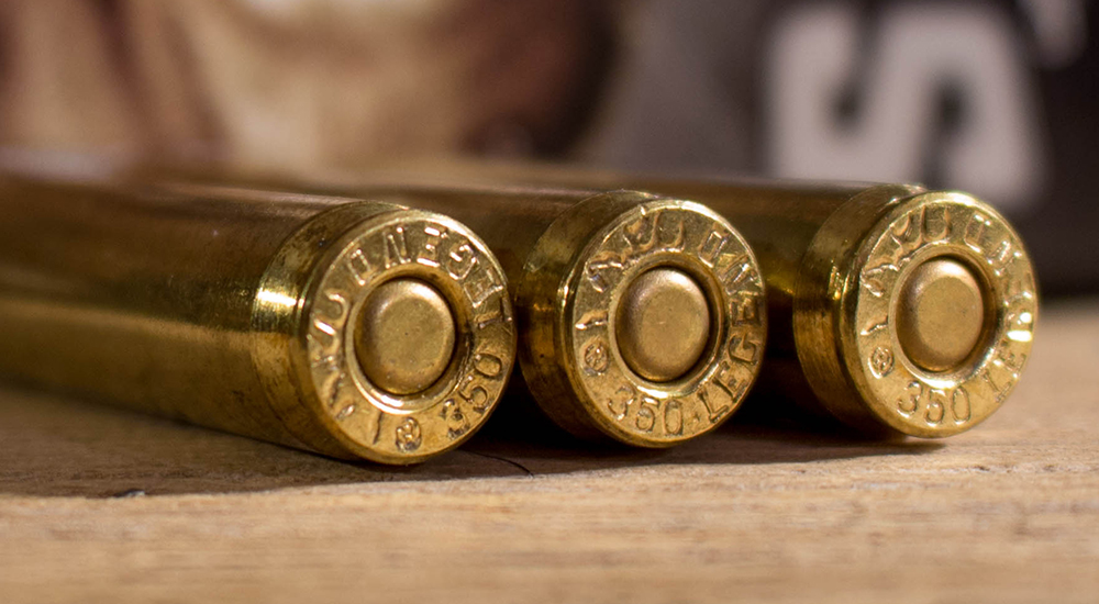 Three 350 Legend Browning ammunition cartridge head stamps.