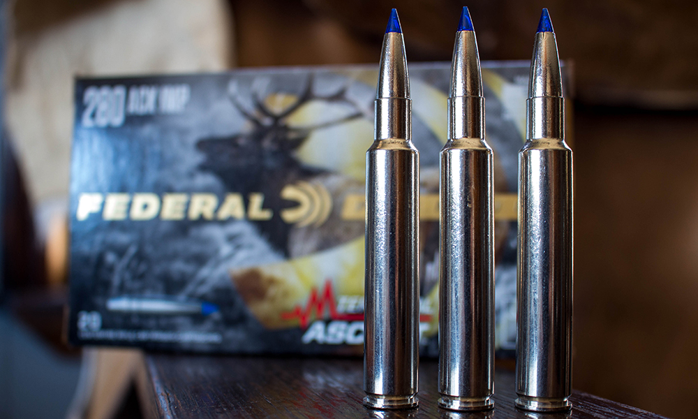 Three .280 Ackley Improved Federal Premium rifle cartridges.