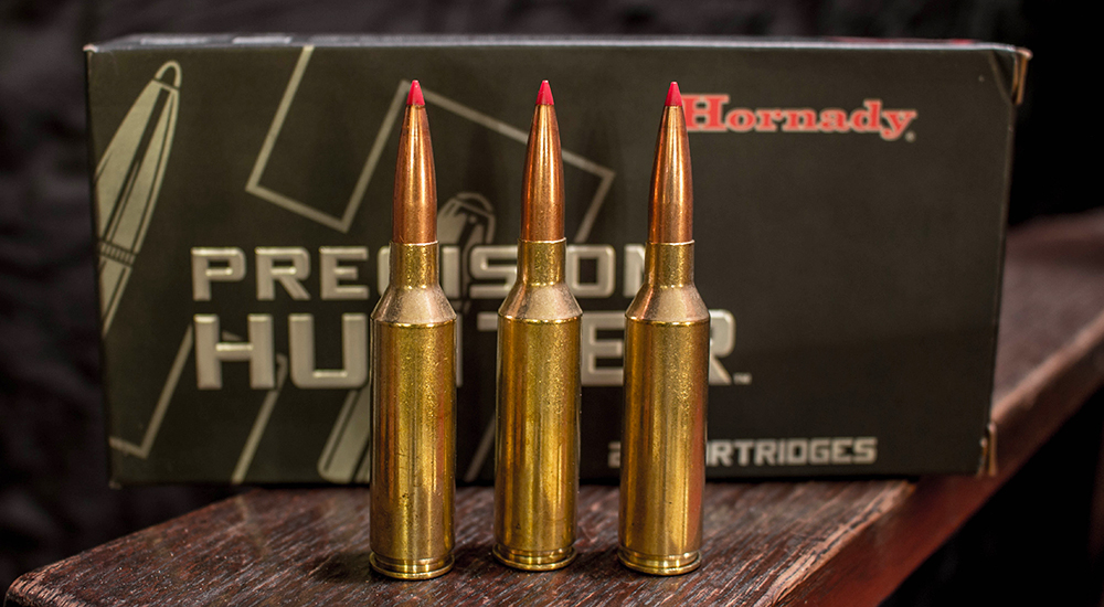 Three rounds of 6.5 Precision Rifle Cartridge Hornady Precision Hunter ammunition.