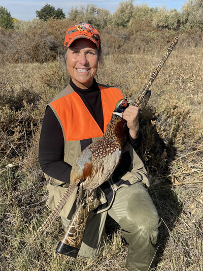 Huntress with pheasant