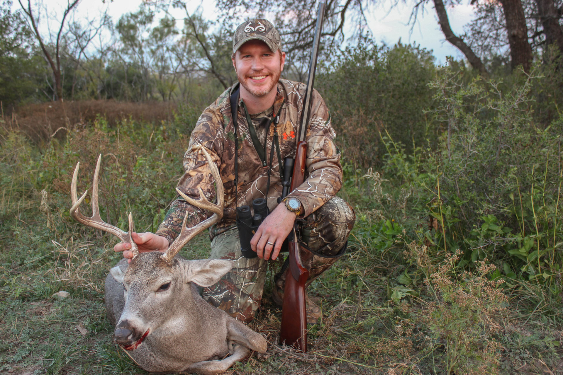 Hunter with buck