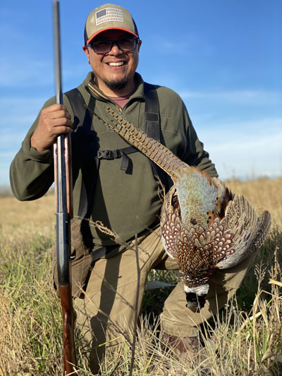 Hunter with Pheasant