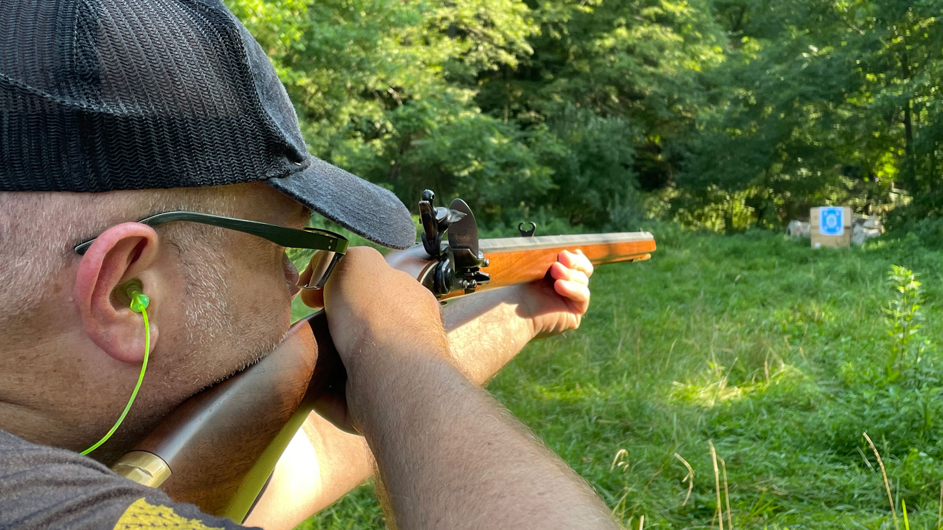 Aiming a flintlock