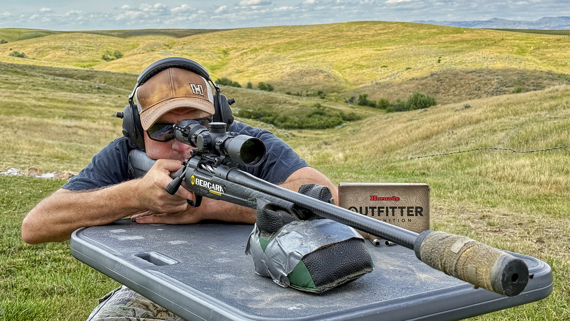 W H2026 07 Knowhow SI357, Mark Kayser Lines Up On A Target At More Than 500 Yards In His Pasture Setting, Copyright Mark Kayser